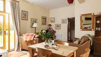 Enjoy meals in this light and bright space with views to the garden.