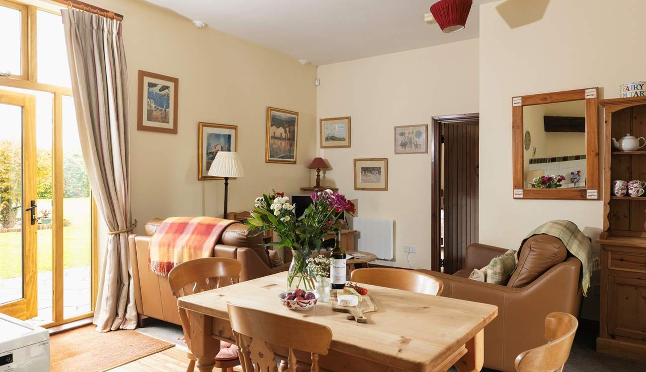 Enjoy meals in this light and bright space with views to the garden