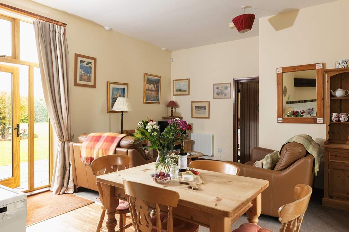 Enjoy meals in this light and bright space with views to the garden