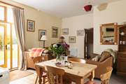 Enjoy meals in this light and bright space with views to the garden