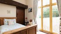Bedroom 2 is so bright and welcoming.