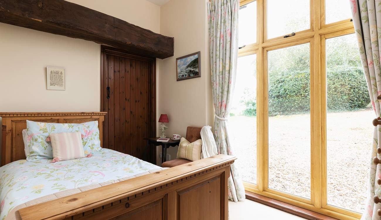 Bedroom 2 is so bright and welcoming.