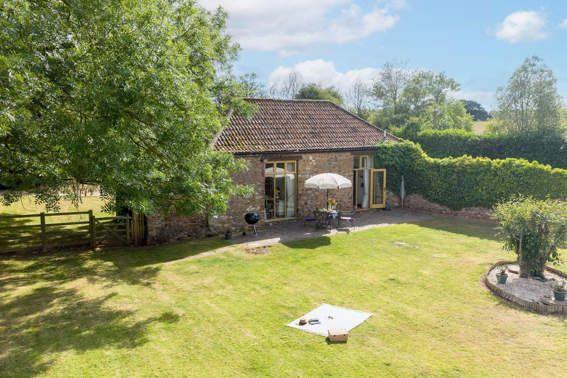 The Barn has a really large, level and fully enclosed garden. An ideal safe place for a great run around for children or of course four legged friends.