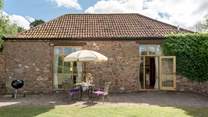 Orchard Barn is a detached barn conversion in the fringes of the Quantock Hills with the most stunning grounds and gardens