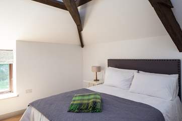 Bedroom 1 is such a pretty room with views to the river