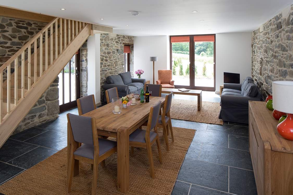 A warm welcome awaits at Ida Cottage when you enter the open plan sitting/dining room with doors out on to the patio.