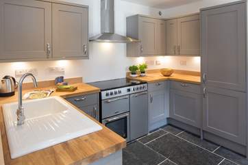 The well equipped kitchen provides plenty of equipment to conjour up a family feast.