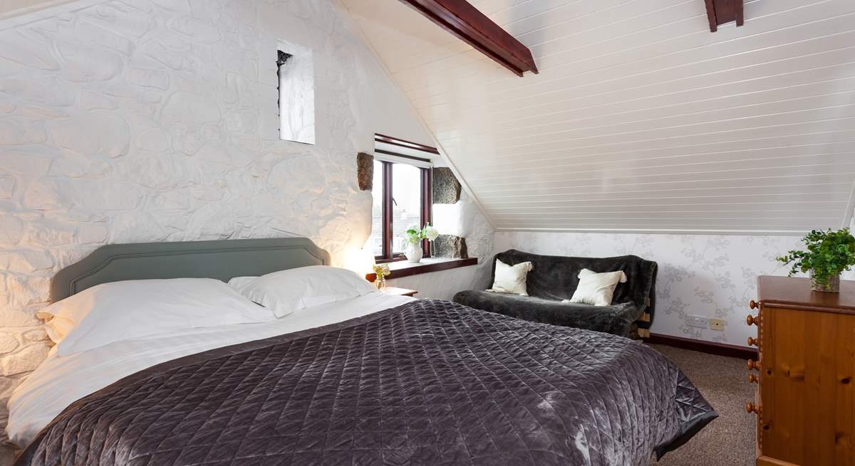 Enjoy a deep slumber in the main bedroom.