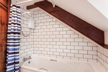 The bathroom on the first floor.