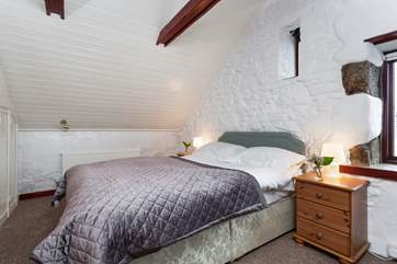 The sloped ceiling makes this room lovely and cosy.