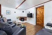 Enjoy a good film and the warm glow of the electric fire, there is also plenty of space for your dogs bed to ensure they are nice and cosy.