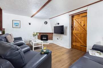 Enjoy a good film and the warm glow of the electric fire, there is also plenty of space for your dogs bed to ensure they are nice and cosy.