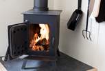 This cosy little wood-burner will keep you very warm and toasty.