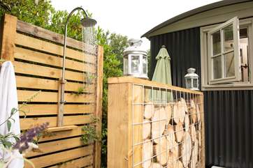 The unique outside shower is fed by a spring.