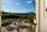Sat in its own meadow to take advantage of the views, there is a patio-area with fire-pit barbecue, table and chairs.