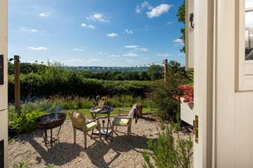 Sat in its own meadow to take advantage of the views, there is a patio-area with fire-pit barbecue, table and chairs.