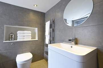Built-in storage for toiletries.