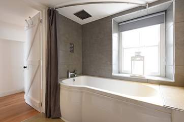 The bathroom is on the ground floor (there's limited headroom standing in the bath so the fitted shower will not be suitable for all).