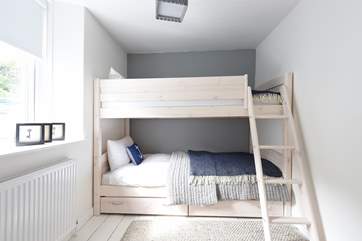 Both beds are full-size single beds.