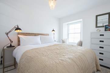 The main bedroom has lovely sea views.