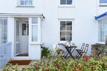 A sheltered spot for morning coffee or evening drinks while watching the world go by.