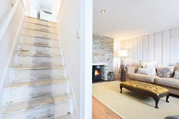 Steep cottage stairs lead up to the bedrooms.
