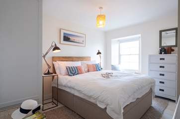 The main bedroom has lovely sea views.