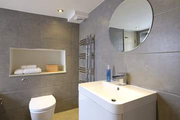 Built-in storage for toiletries.