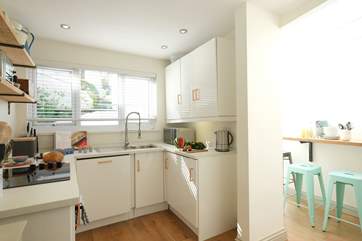 The kitchen/diner is compact but ideal for preparing light meals.