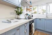 Cook a culinary delight in the well-equipped kitchen.