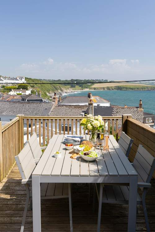 Dine al fresco with stunning sea views.