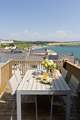 Dine al fresco with stunning sea views.
