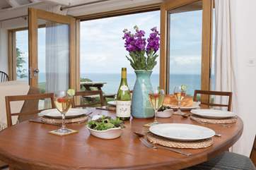 The dining-table shares that spectacular view.