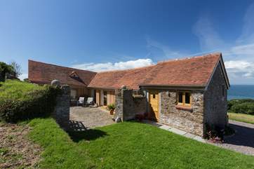 Set at the top of a field with 180 degree sea views.