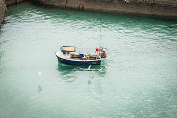 Watch the fishing boats return into harbour from the comfort of the living-room or balcony.