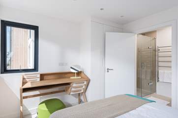 The fabulous en suite has a large shower cubicle with room for two!