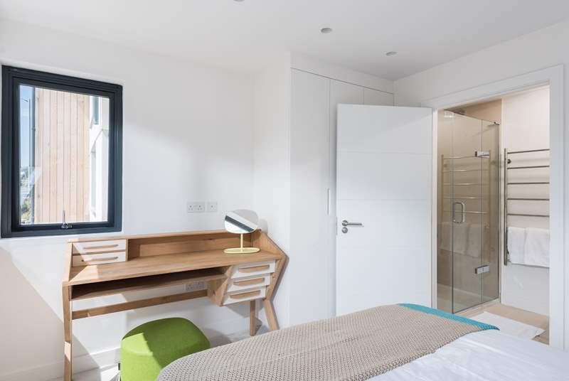 The fabulous en suite has a large shower cubicle with room for two!