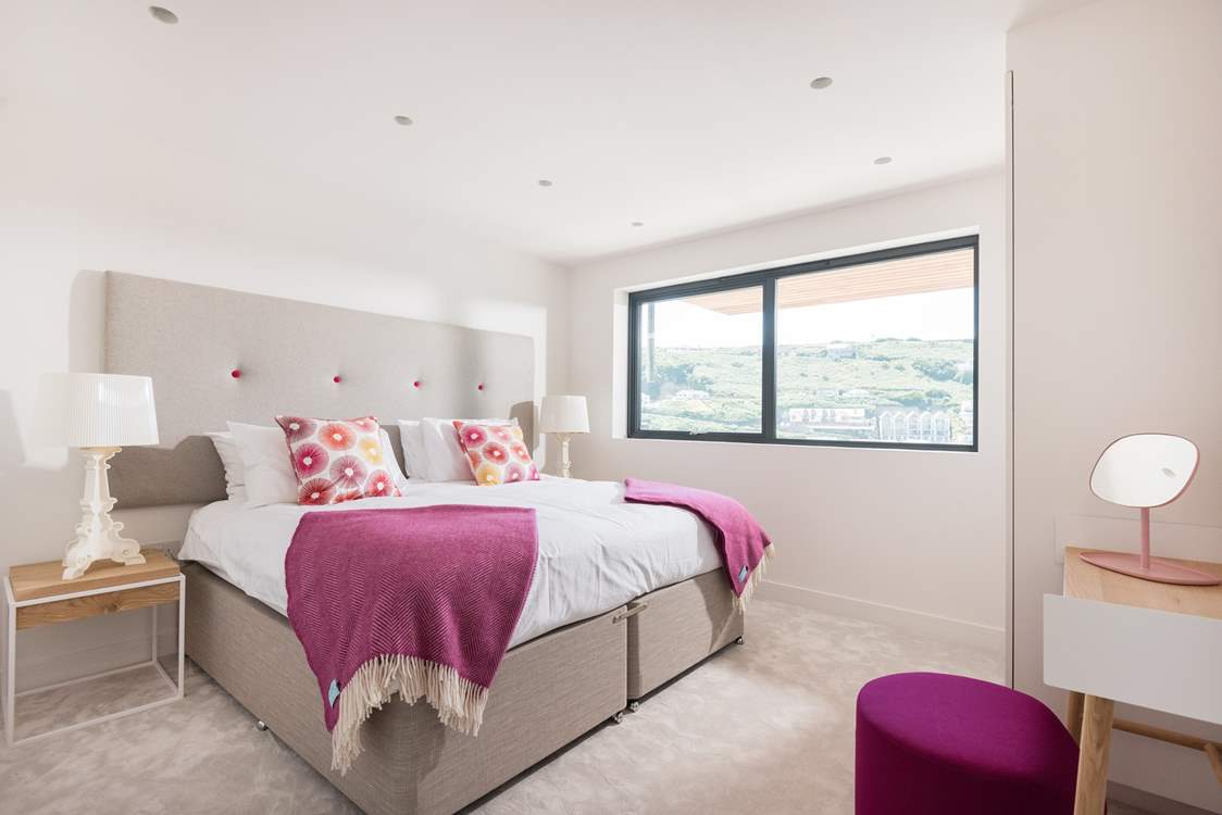 This gorgeous bedroom has a super-king double bed which can also be made up as two 3ft single beds. (There are now blinds at the windows).