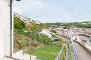 Looking over the garden and down to the village from your elevated balcony view.