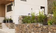 There is a parking space at the house and further parking can be found in the road or down in the village.