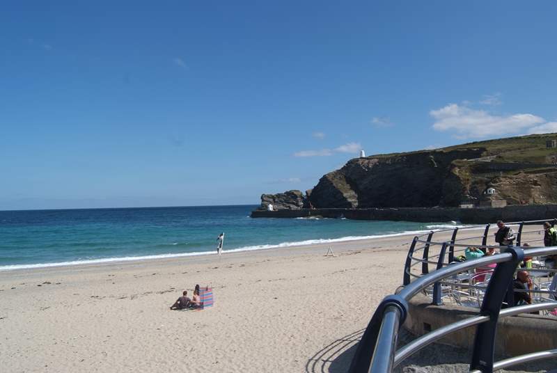 The fabulous family-friendly sandy beach at Portreath, great for sandcastles, sunbathing and popular with surfers.