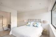 The main bedroom with en suite shower-room.