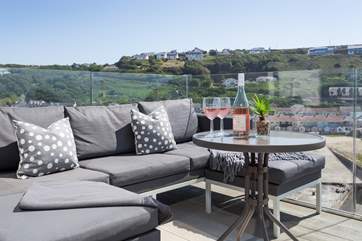 Have a drink with a view on the balcony at Rockaway