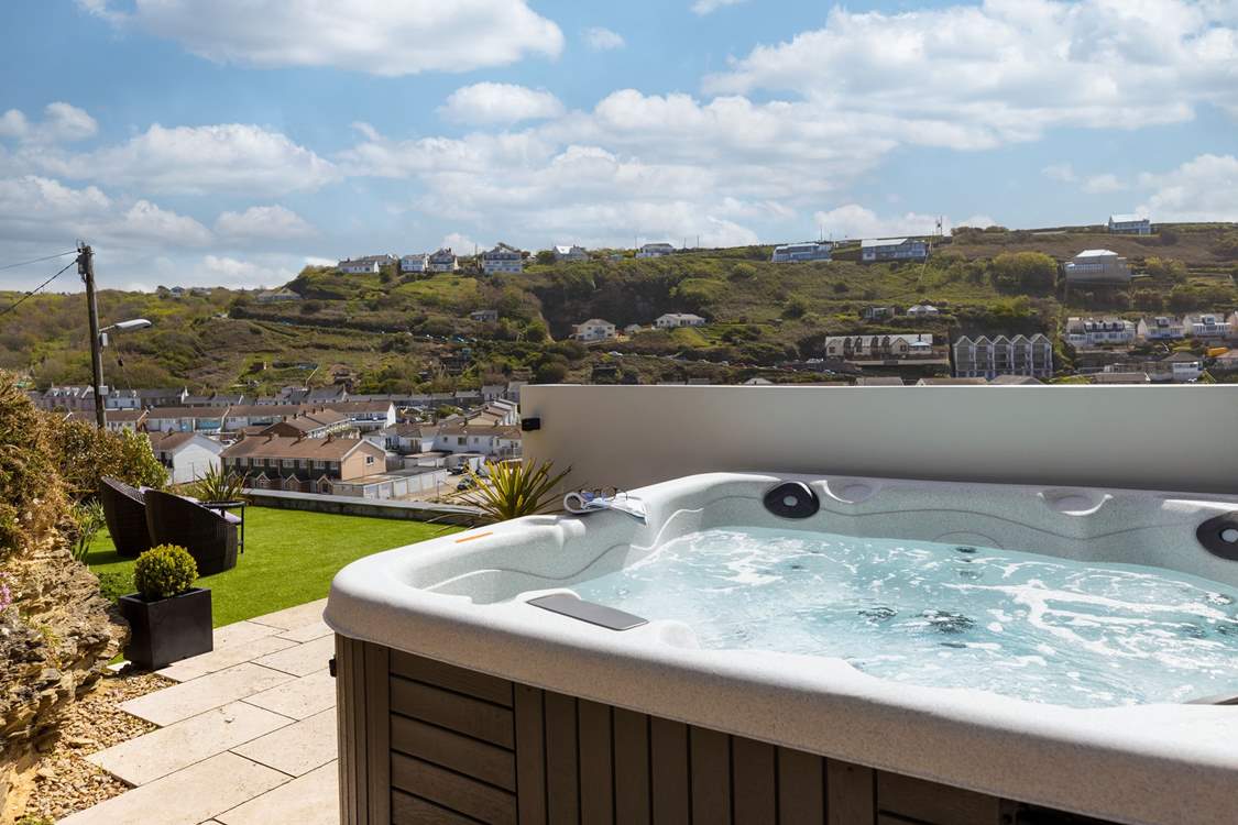 Relax in the hot tub and enjoy the superb views over Portreath.