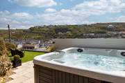 Relax in the hot tub and enjoy the superb views over Portreath.