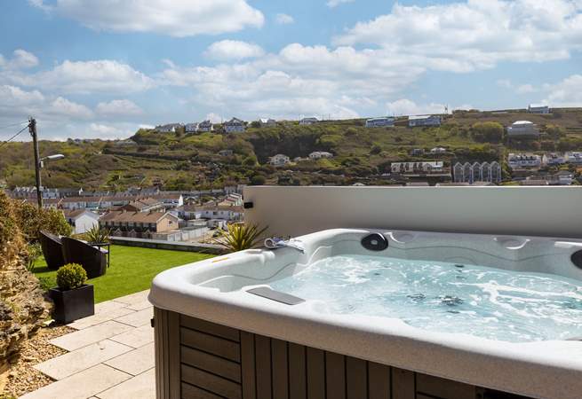 Relax in the hot tub and enjoy the superb views over Portreath.