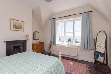 The double bedroom with sea views to take in from your bed - what a way to start the day. The little Victorian fireplace is a lovely feature.