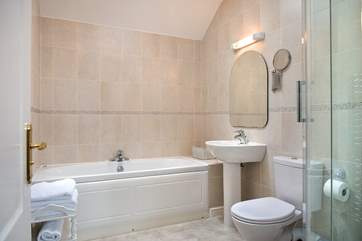 The family bathroom has a bath...