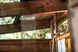 The outdoor shower has hot water...no need to freeze just because you're showering al fresco!