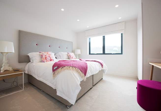 Bedroom two with a super-king size double bed which can also be two three-foot single beds on request.